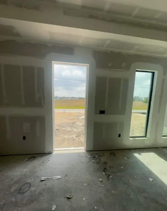 Interior hanging, taping, and finishing completed by builder in Sanibel in hurricane Ian re-construction