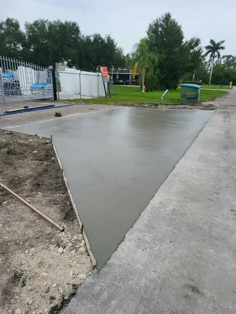 Finished concrete driveway over a culvert.