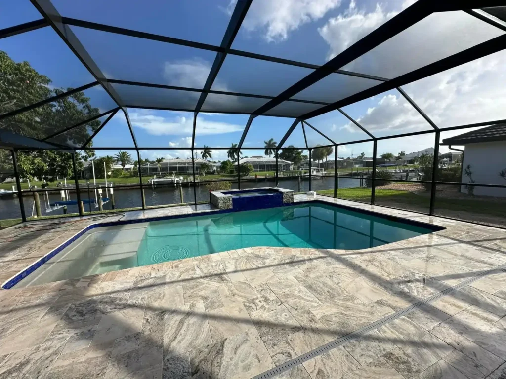 Fully renovated pool with water and finished tile flooring.