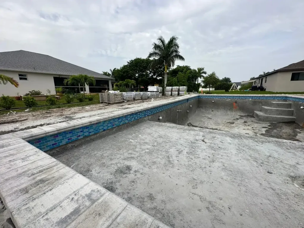 Newly installed pool tile and coping.