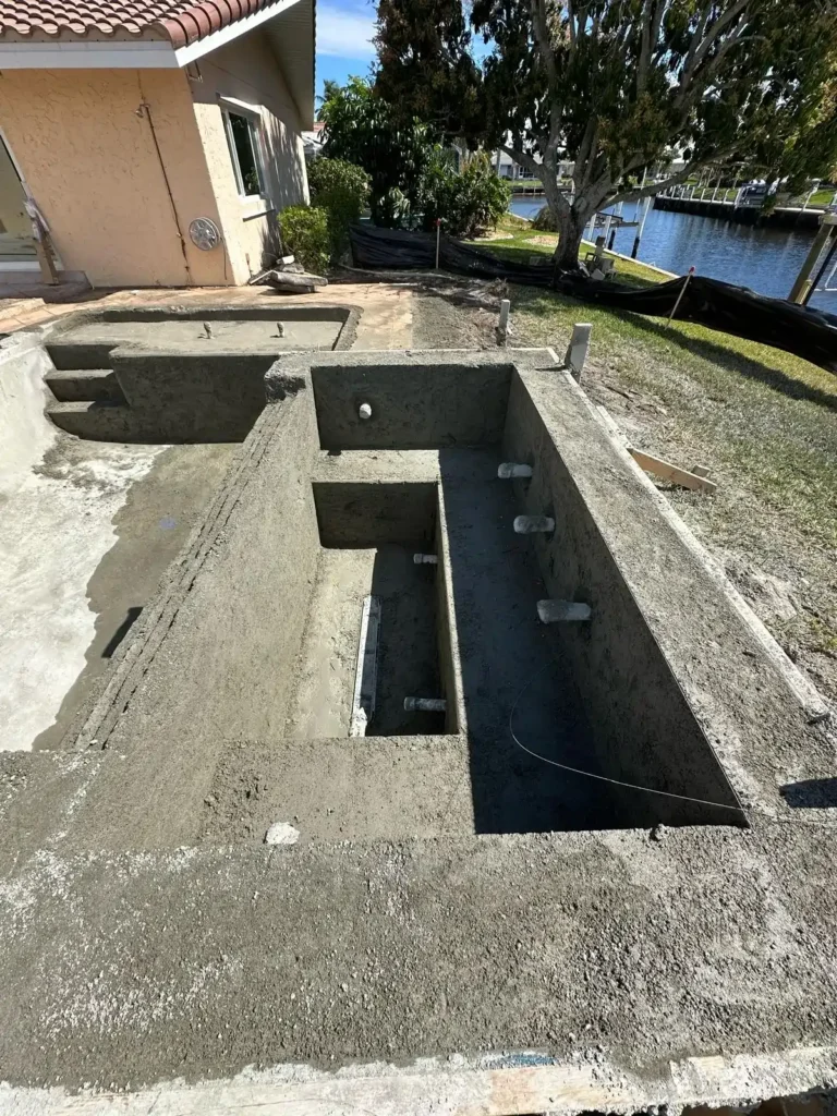 Close-up of concrete structure during pool renovation.