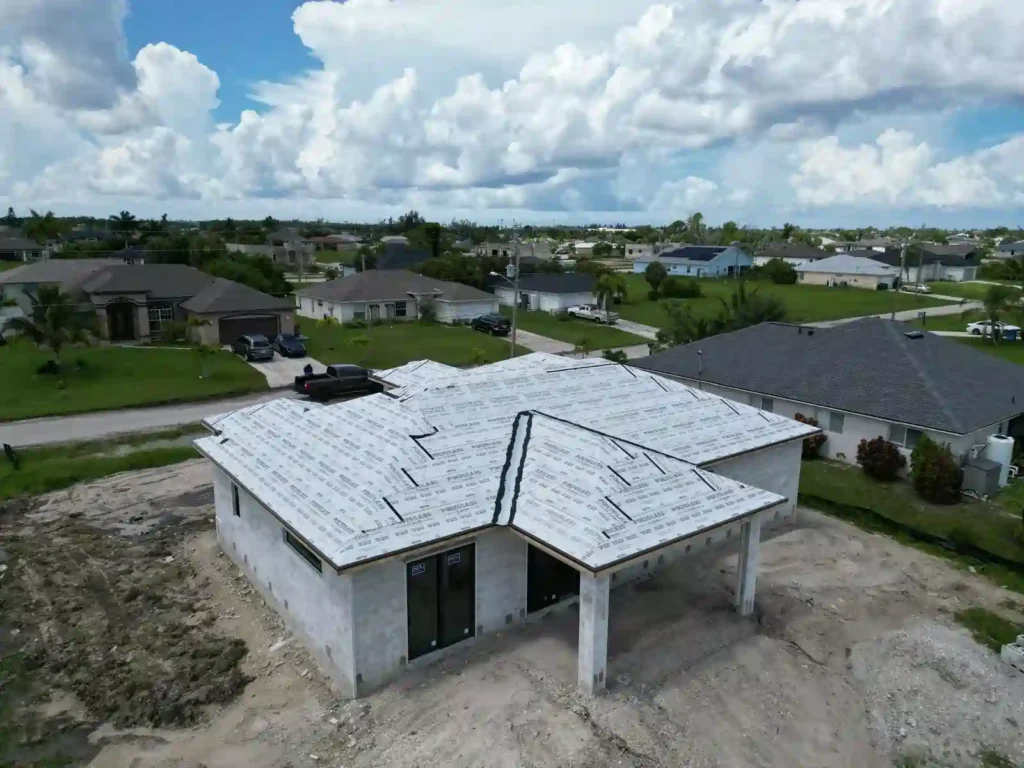 Roof underlayment installation from another angle, showing the detailed work.