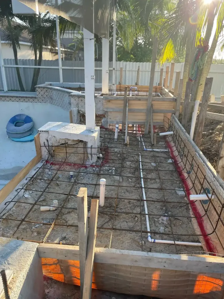 Early spa renovation with piping and concrete framework.