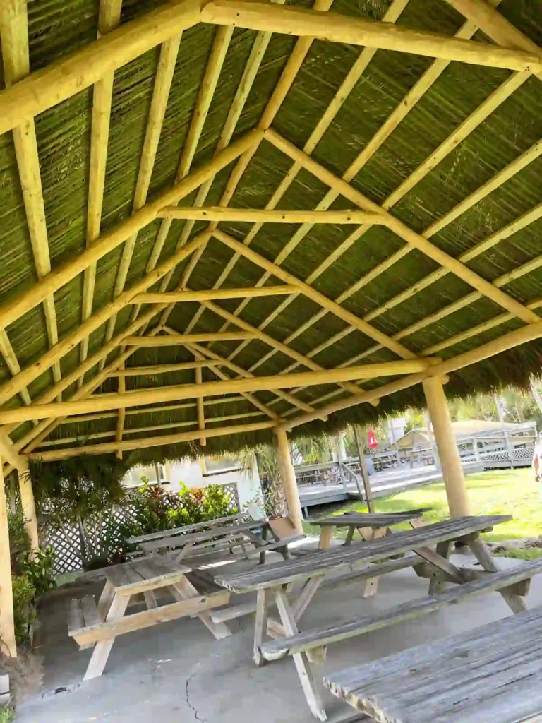 View of the thatching and support structure inside a tiki hut.