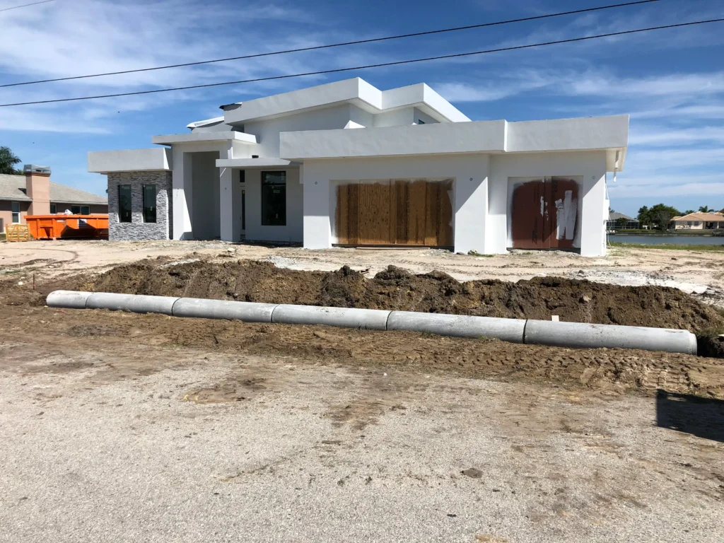 Concrete culverts at a new construction home in Cape Coral, Florida, freshly inspected and approved.